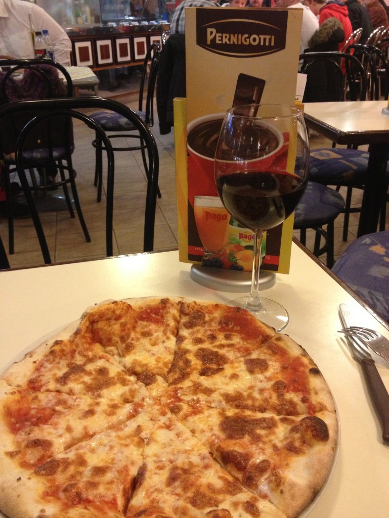 The pizza at my favorite place, Eis Cafe Roma. The owners are from Sicily. I wonder what I will have to do to get them to come back to the states with me.