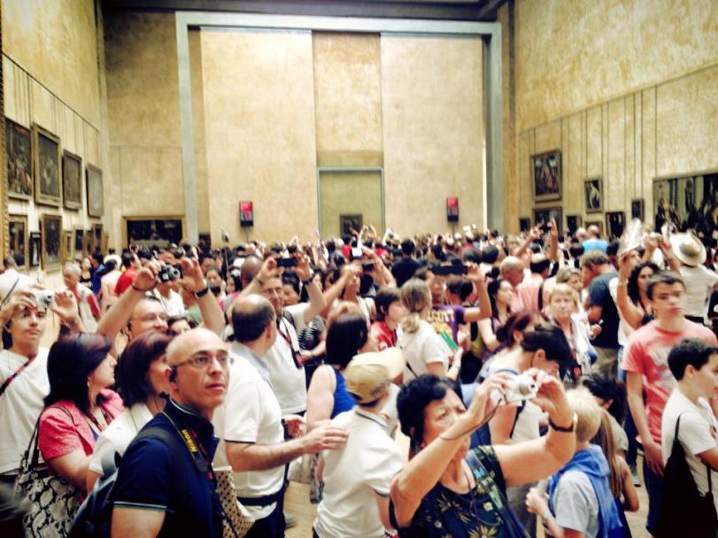 The reason pickpockets love the Louvre - tourists are too busy getting their picture of the Mona Lisa to pay attention to their pockets!