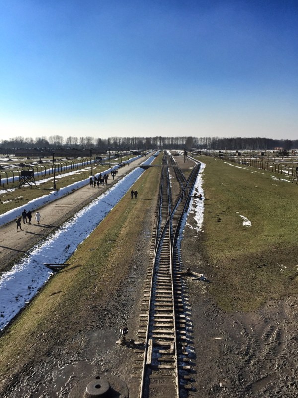 The view of the camp and the railroad tracks from the tower at the front of the camp. It was through this gate the trains would come daily.