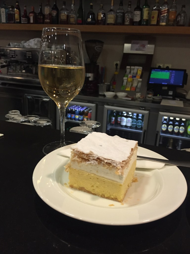 The Bled Creme Cake...with a glass of underrated Slovenia wine.