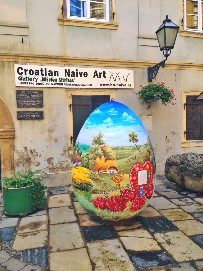 Those red hearts are Licitarsko srce (Gingerbread heart), given as gifts to loved ones.