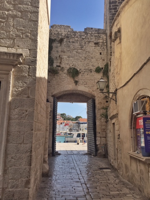 The town is surrounded by a wall with gates.